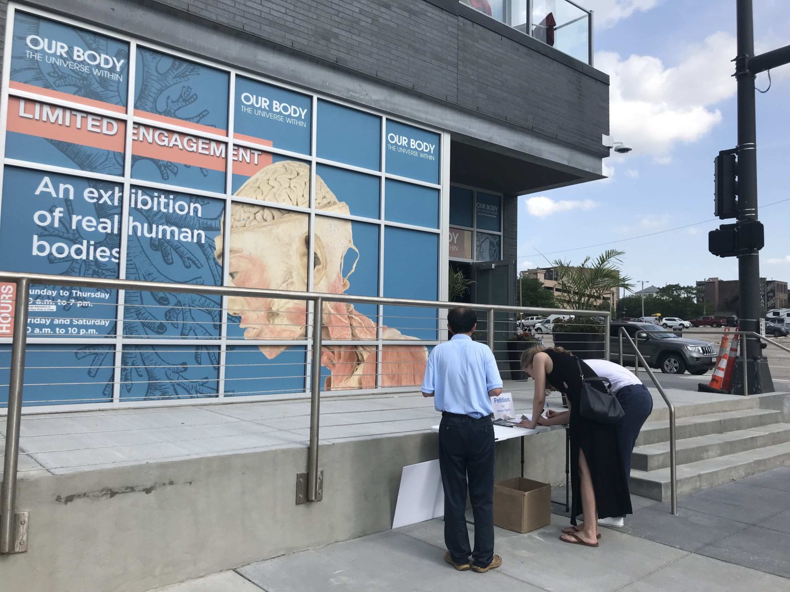 Falun Gong Practitioners Protest Exhibit That Sources Human Bodies from